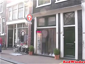 Amsterdam escort fellates client